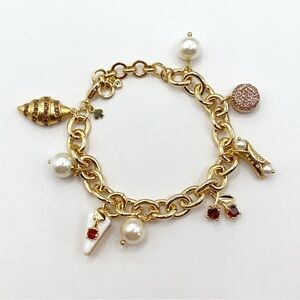 Kate Spade croissant and cherry shortcake bracelet
